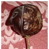 carved hatpin