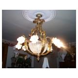 One of 2 French bronze/crystal chndeliers