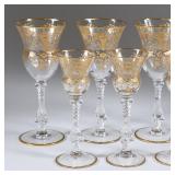 Large Set of Gilt Decorated Etched Glass Cordials and Champagne Glasses