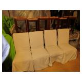 four covered chairs