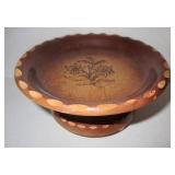 wooden bowl on pedestal