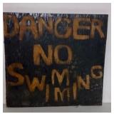 "NO SWIMMING" Sign