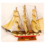 wooden ship on base