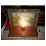 lighted signed painting