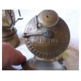 pair of miners head lamps (1 Auto lite, 1 Justrite) carbide