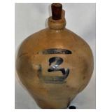 two very early ovoid jugs with blue decoration