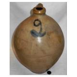 two very early ovoid jugs with blue decoration