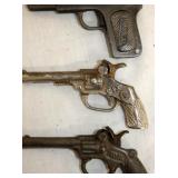 VIEW 2 CLOSEUP EARLY CAP PISTOLS 