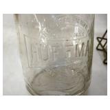 VIEW 6 CLOSEUP EMBOSSED BOTTLES