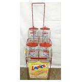 4 JAR LANCE RACK W/ JARS AND SIGN