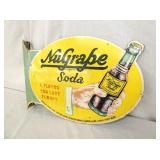 VIEW 4 NUGRAPE FLANGE W/ BOTTLE IN HAND