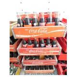 VARIOUS COKE BOTTLES AND CRATES