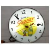 15IN SQUIRT PAM CLOCK