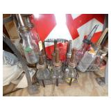 VARIOUS OIL BOTTLES W/ CARRIERS