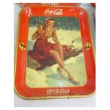 ADV. COKE TRAY LADY IN SNOW