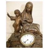 VIEW 2 CLOSEUP MOTHER W/ CHILD