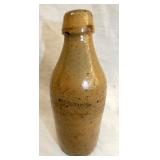 SIGNED JERUSALEM STONEWARE BOTTLE