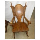 ORNATE OAK ROCKER W/ PRESSED CARVINGS