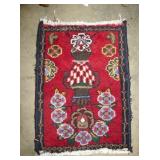 24IN HAND LOOMED RUG W/ VASE PATTERN