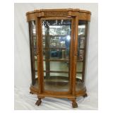 OAK CHINA CLOSET W/ LION HEADS