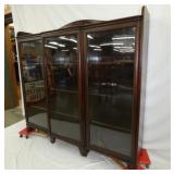 VIEW 2 CLOSEUP W/ TRIPLE DOOR BOOKCASE