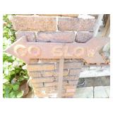 GO SLOW CAST ARROW SIGN