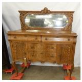 ORNATE OAK SERP. FRONT SIDEBOARD