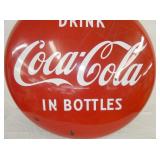 VIEW 4 PORC. BUTTON COKE IN BOTTLES