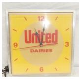 UNITED DAIRIES PLASTIC LIGHT UP CLOCK