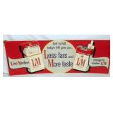 L&M "LESS FOR MORE TASTE" SIGN