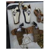 EARLY SET TOY CAP PISTOLS W/ HOLSTERS
