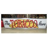 LIGHTED THE TOBACCO STORE SIGN