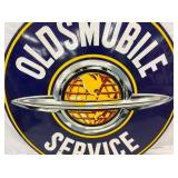 CLOSEUP PORC. OLDSMOBILE SIGN