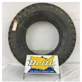 DELTA STORE TIRE DISPLAY W/ TIRE