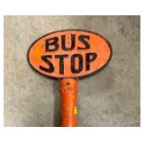 CLOSEUP EMB. CAST BUS STOP SIGN