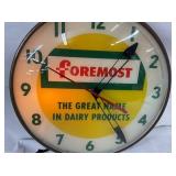 CLOSEUP FOREMOST DAIRY CLOCK
