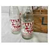 CLOSE UP LITTLE TOMS BOTTLES