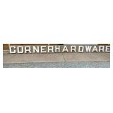 CORNER HARDWARE SIGN