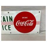 CLOSEUP RIGHTSIDE COKE SIGN