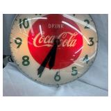 CLOSEUP 15IN COKE CLOCK W/ GREEN LETTERS