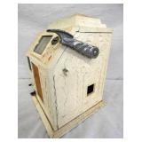 SIDE VIEW COIN OP GUM MACHINE