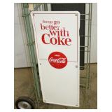 CLOSEUP OTHERSIDE COKE SIGN