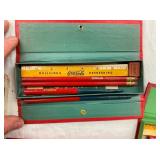 CLOSE UP INSIDE COCA-COLA DRAWING SETS