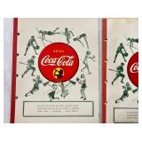 CLOSE UP VIEW COCA-COLA NOTEBOOKS 