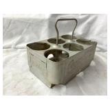 CLOSE UP ALUM. COKE CARRIER