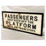 PASSENGERS KEEP OFF PLATFORM CAST SIGN