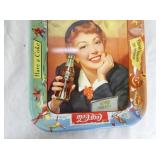 BOTTOM CLOSE UP VIEW W/LADY & BOTTLE