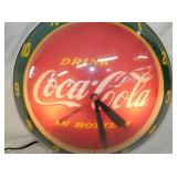 CLOSE UP VIEW CONTEMPORARY COKE CLOCK