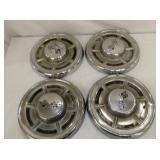 (4) EARLY CORVETTE HUB CAPS