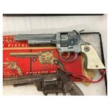 VIEW 2 CLOSEUP EARLY CAP PISTOLS